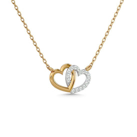 Diamond 1/6 Ct.Tw. Duel Heart Pendant in 10K Two Tone Gold - Larson Jewelers