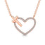 10K Rose Gold Diamond 1/10 Ct.Tw. Heart and Cross Pendant - Larson Jewelers